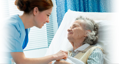 Pflegekraft mit Pflegebedürftiger Person